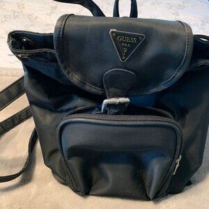 Small Guess black backpack in perfect condition